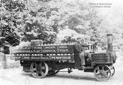 Pickup Pop Steamer c.1905. Anthony (Anty) Gray at the wheel of a steam-powered Mann vehicle when he worked for Pickup Bros.